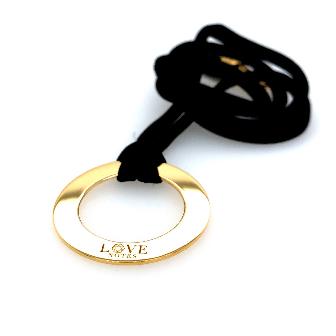 Al segno rondo necklace goldplated with silkstrap.