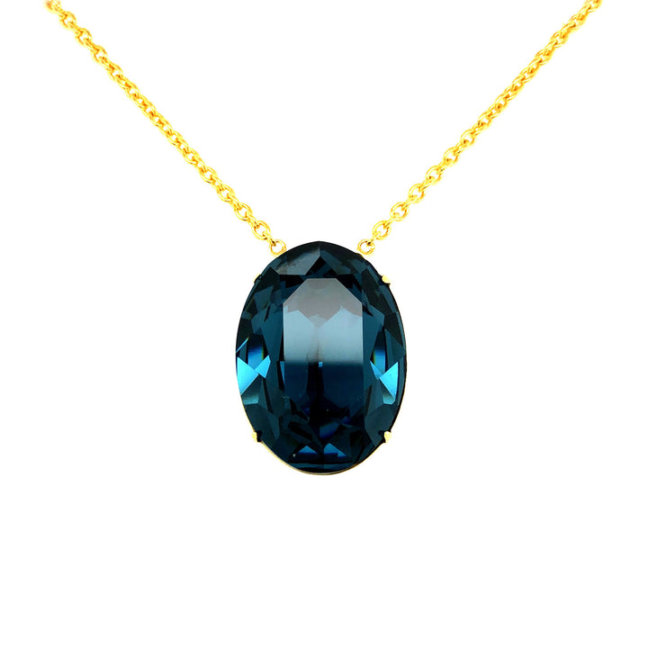 Victoria collection – necklace with goldplated silverchain and blue crystal.